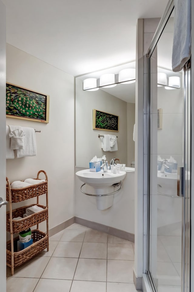 bathroom featuring tile patterned floors and walk in shower