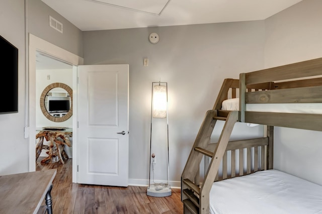 bedroom featuring dark hardwood / wood-style floors