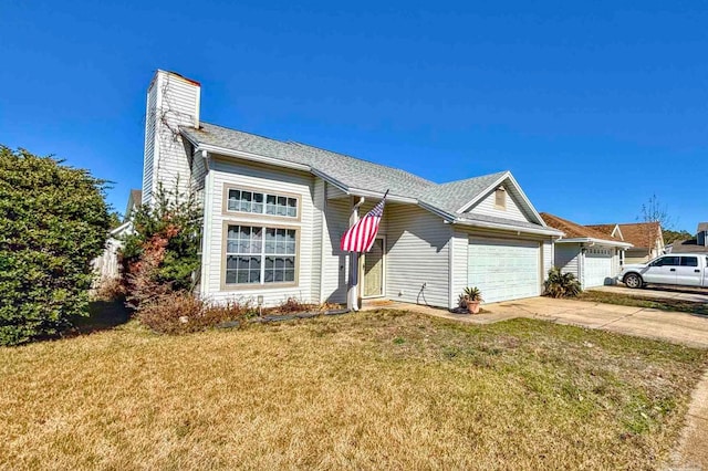 ranch-style house featuring a garage and a front yard