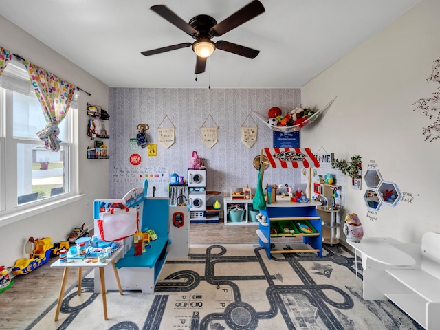 recreation room with hardwood / wood-style flooring