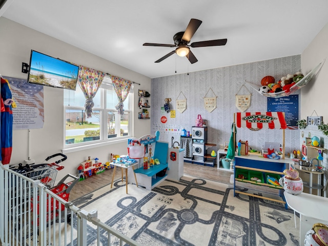 recreation room with ceiling fan