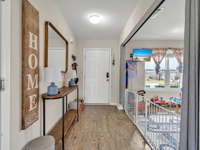 entryway featuring light hardwood / wood-style floors