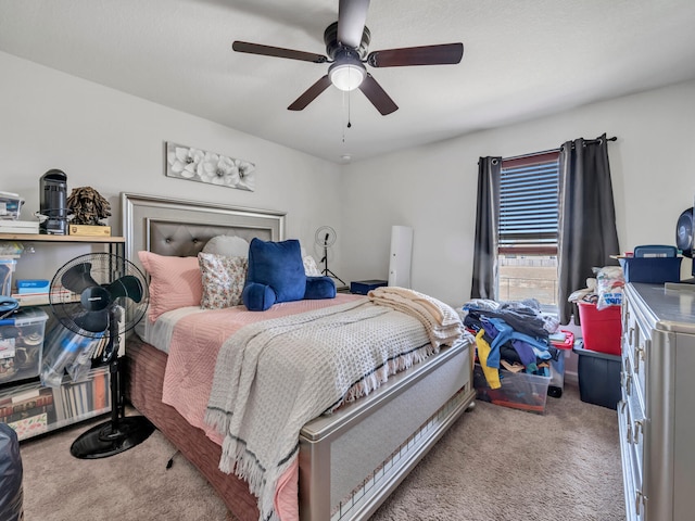 bedroom featuring light carpet and ceiling fan