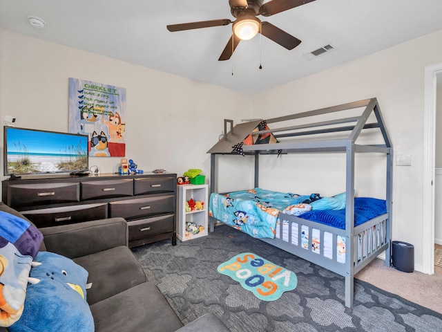 carpeted bedroom featuring ceiling fan