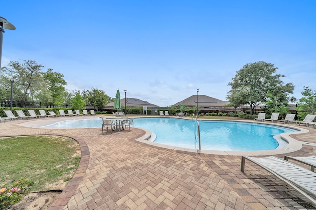 view of pool with a patio area