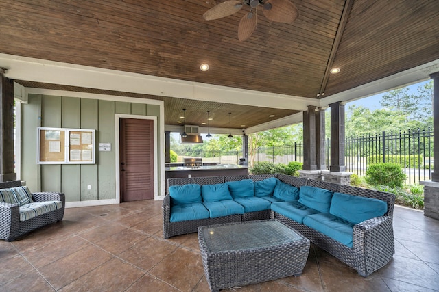 view of patio / terrace with an outdoor living space and ceiling fan