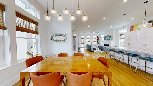 dining space featuring light hardwood / wood-style floors