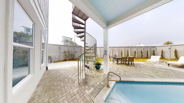 view of pool with a patio