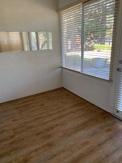 empty room featuring dark hardwood / wood-style floors