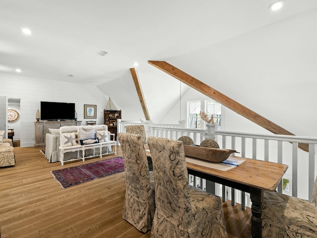 dining area featuring lofted ceiling with beams, wood finished floors, visible vents, and recessed lighting