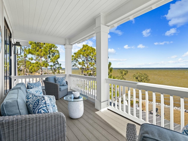 deck with an outdoor hangout area