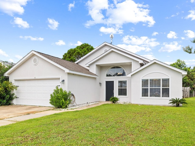 ranch-style house with a garage and a front lawn