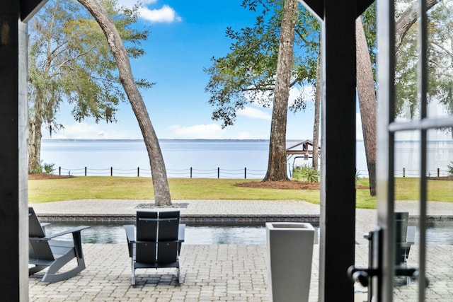 entryway with a water view