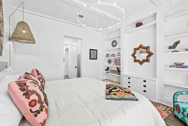 bedroom featuring hardwood / wood-style flooring and wooden ceiling