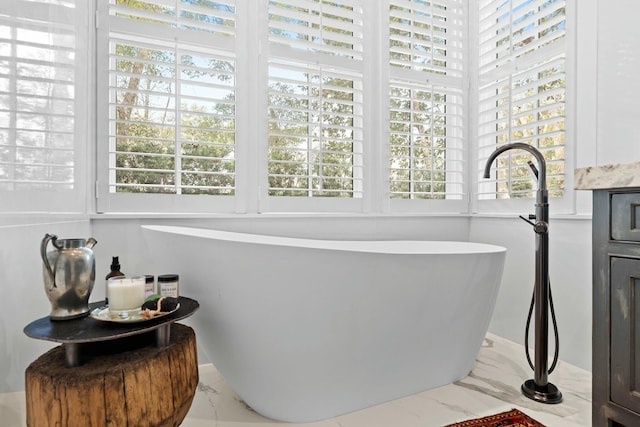 bathroom featuring a tub