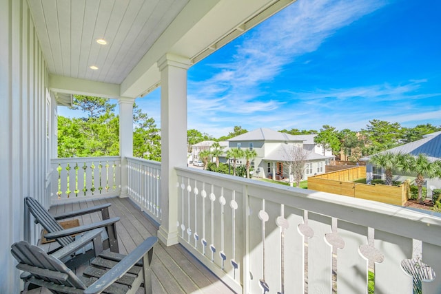 balcony featuring a residential view and a porch