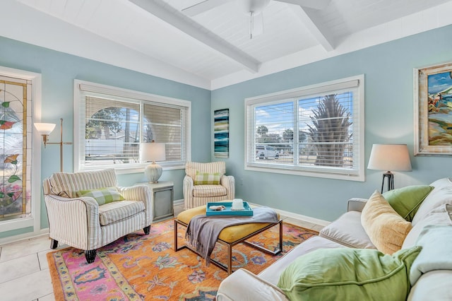 tiled living room with vaulted ceiling with beams and ceiling fan