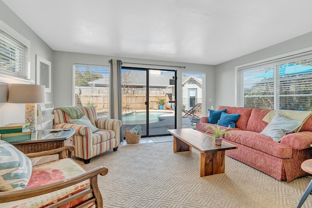 living room featuring light carpet