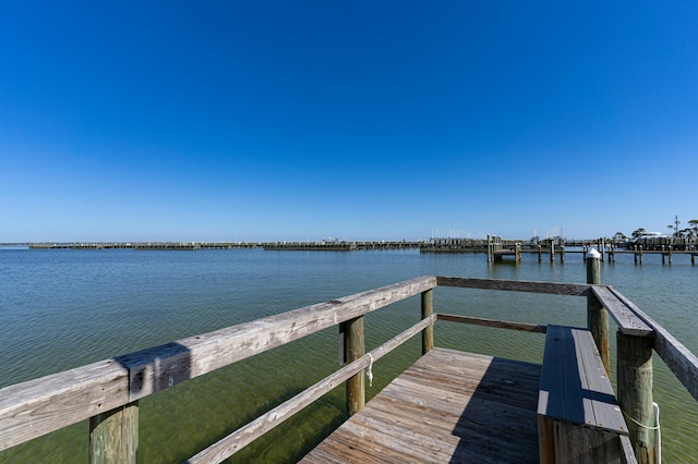 view of dock with a water view