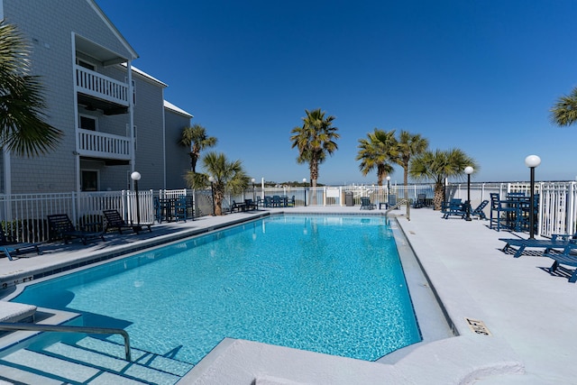 view of pool featuring a patio