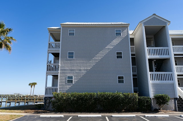 view of building exterior featuring a water view