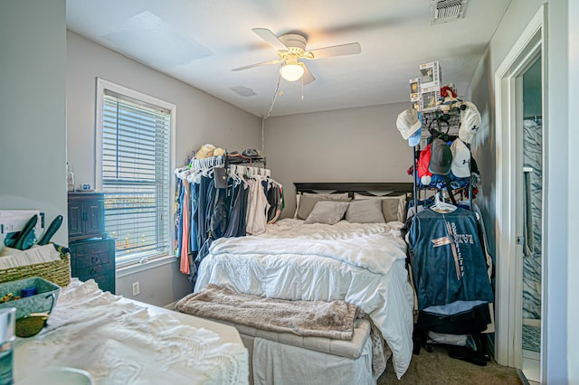 carpeted bedroom with ceiling fan