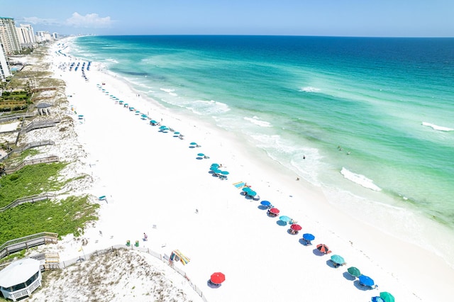 aerial view featuring a water view and a view of the beach