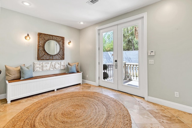 doorway featuring radiator heating unit and french doors