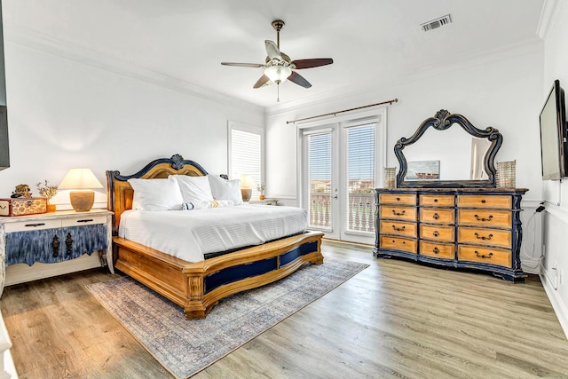 bedroom with crown molding, access to exterior, ceiling fan, and light hardwood / wood-style flooring