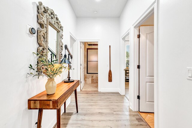 hall featuring light hardwood / wood-style flooring