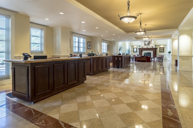 welcome area with sink and decorative columns