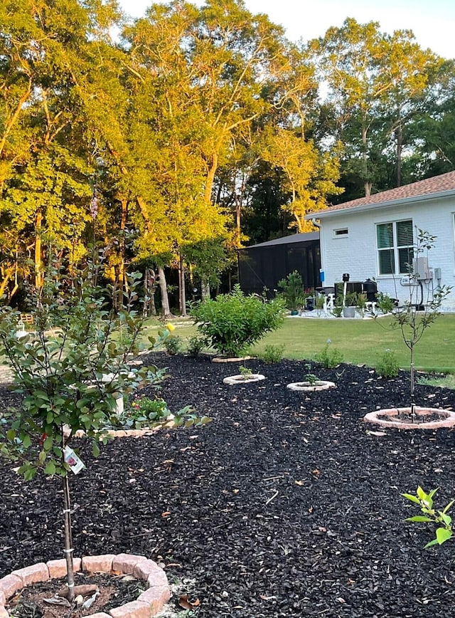 view of yard with a fire pit