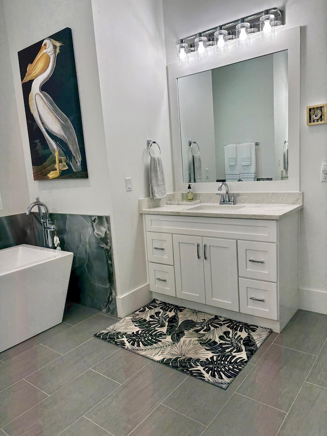 bathroom with vanity and a bathing tub