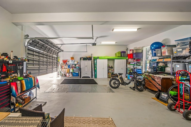 garage featuring a garage door opener