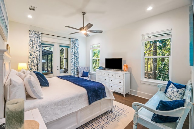 bedroom featuring hardwood / wood-style flooring, ceiling fan, access to exterior, and french doors