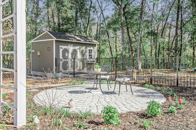 view of patio featuring a storage shed