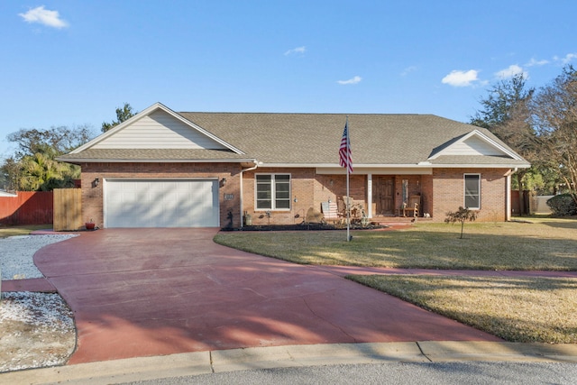 ranch-style home with a garage and a front yard