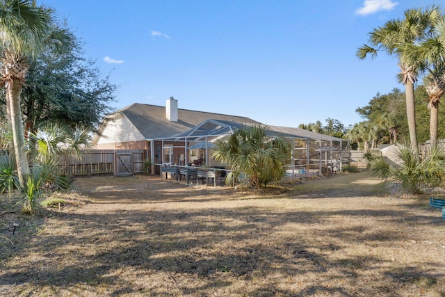 view of yard featuring a lanai