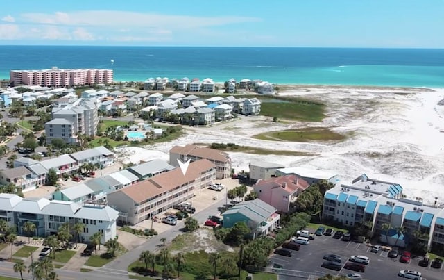 aerial view featuring a beach view and a water view