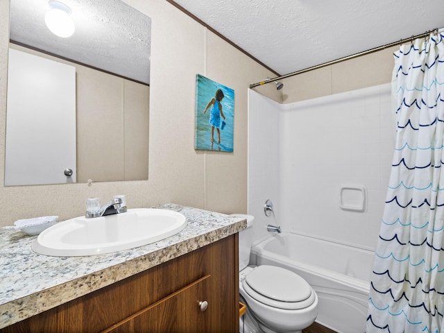 full bathroom with shower / bath combo, vanity, a textured ceiling, and toilet