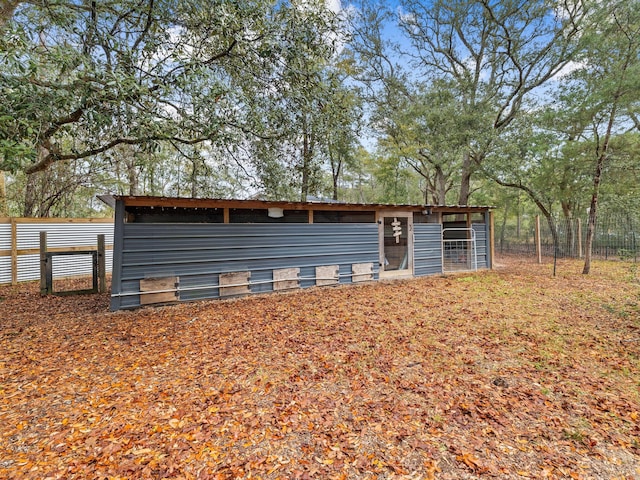 exterior space with an outbuilding