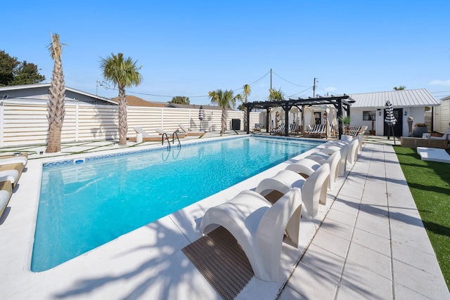 view of swimming pool featuring a pergola and a patio area