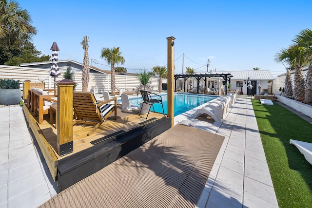 view of swimming pool with a pergola, a patio area, and a deck