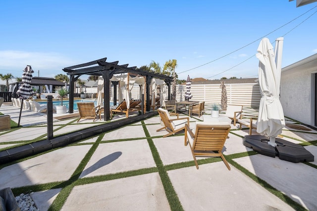 view of patio / terrace featuring a fenced in pool and a pergola