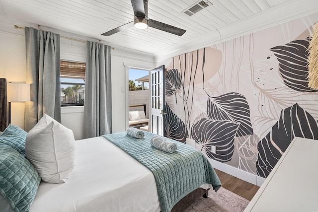 bedroom featuring hardwood / wood-style flooring, ceiling fan, ornamental molding, and wooden ceiling