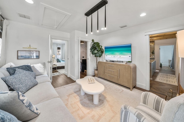 living room featuring parquet floors