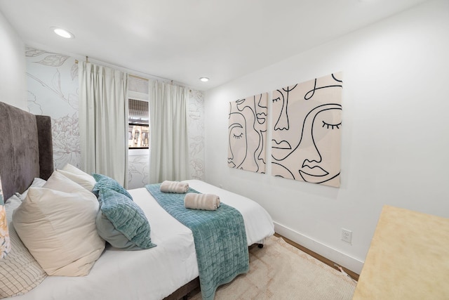 bedroom featuring hardwood / wood-style flooring