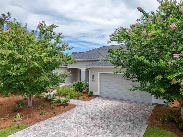 view of front of property featuring a garage