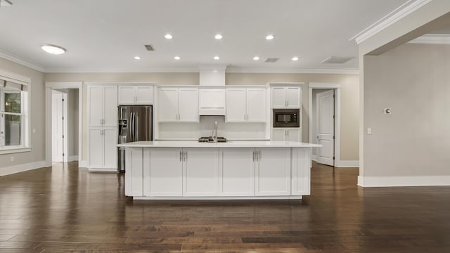 kitchen featuring dark hardwood / wood-style floors, built in microwave, white cabinetry, a kitchen island with sink, and stainless steel refrigerator with ice dispenser