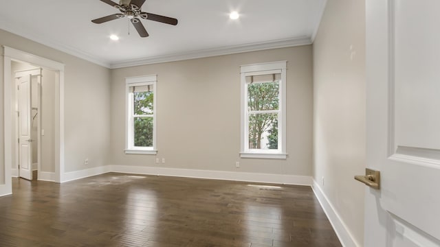 unfurnished room with ornamental molding, dark hardwood / wood-style floors, and ceiling fan